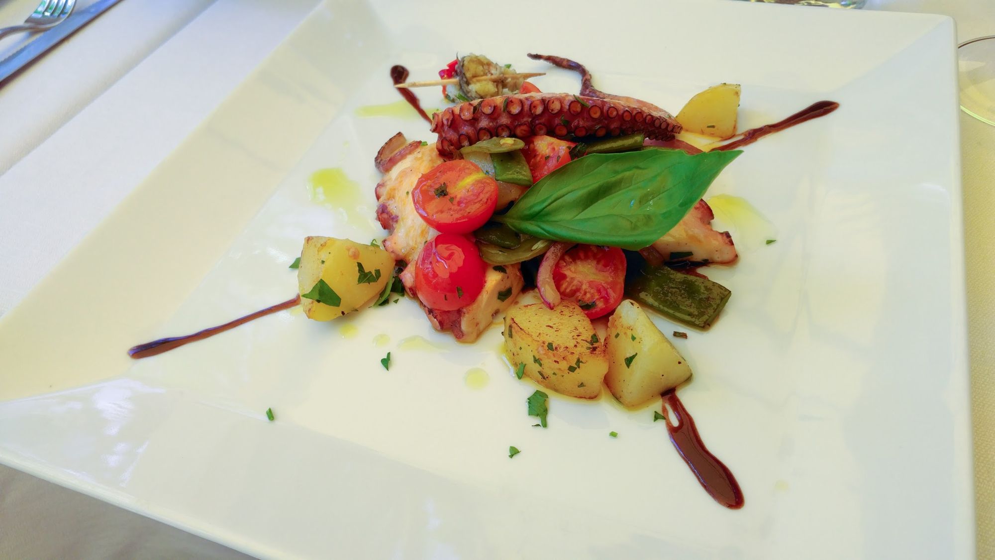 Polpo con patate e pomodorini